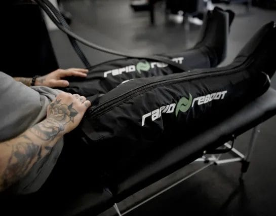 man on Compression Therapy at Elev8 Performace
